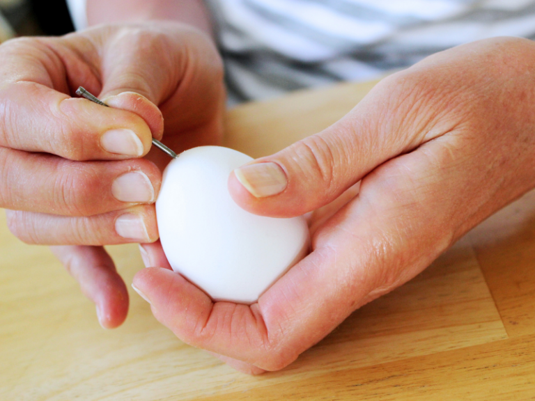 poking hole in egg