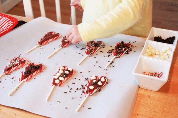 sprinkles on candy cane lollipops