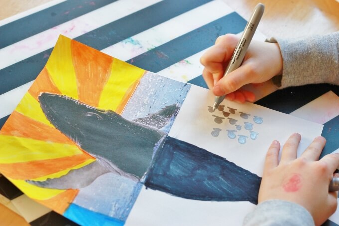 Magazine Pictures as Drawing Prompts for Kids - Maia working on her whale artwork