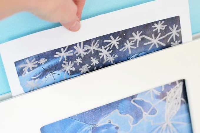 artwork sliding into frame