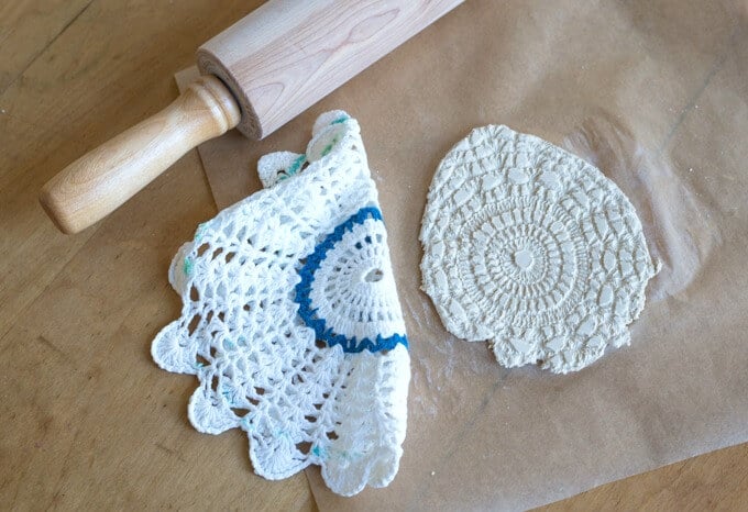 Making lace prints with crochet doilies