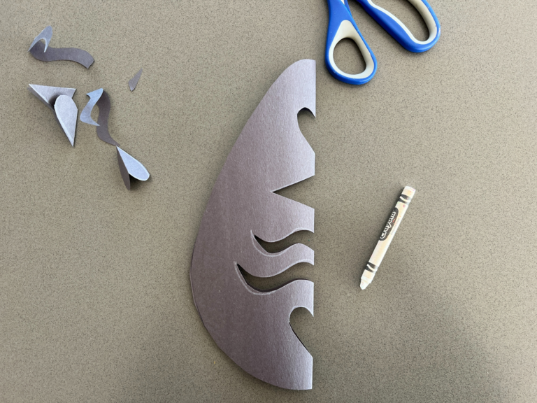 shapes cut out of black paper