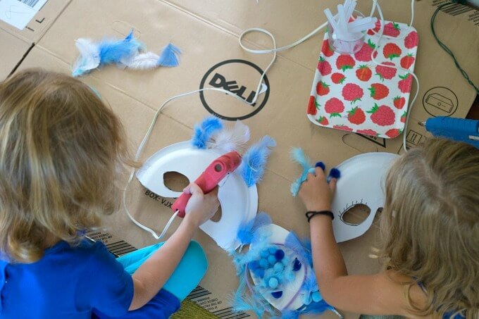 Adding embellishments to paper plate masks