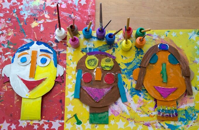 Beautifully and colorfully painted 3D cardboard portraits.