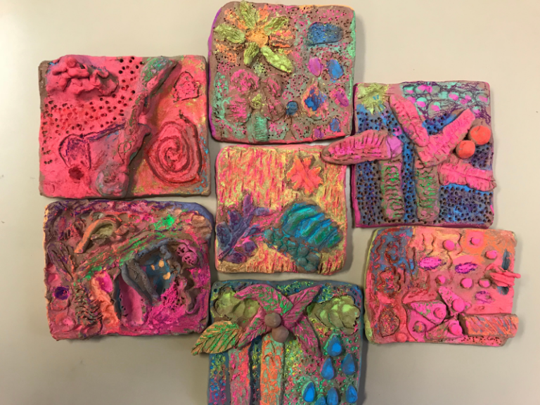 painted clay relief tiles