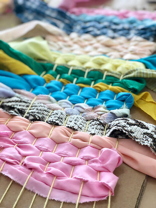 Colorful weaving for kids with a simple cardboard loom