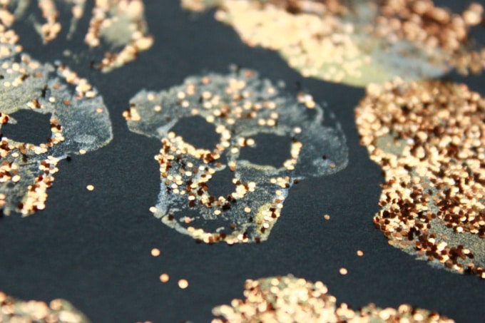 Skull shaped Halloween potato print with glitter