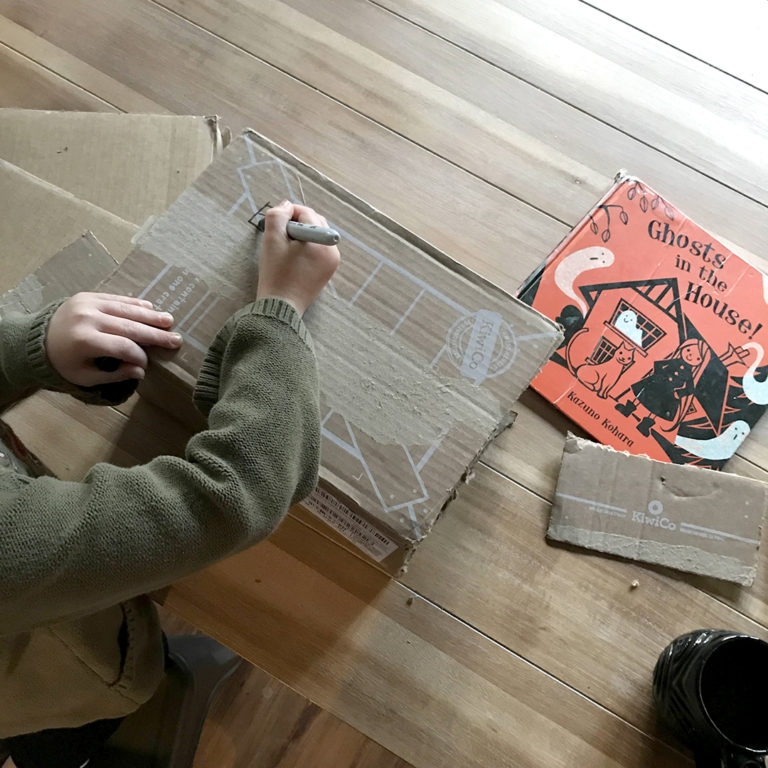 Drawing windows for cardboard Halloween house