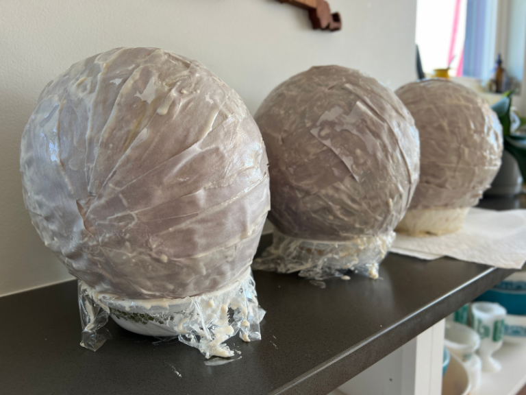 paper mache eggs drying