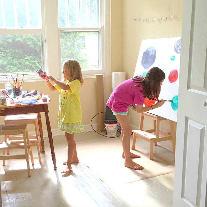 children painting in art room