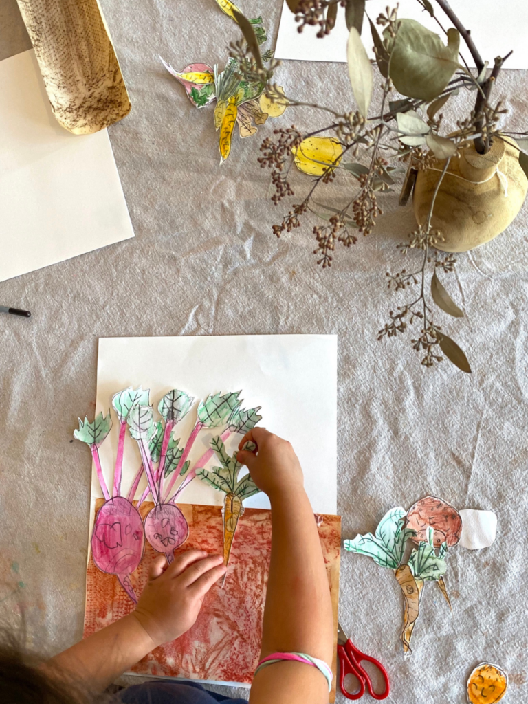 arranging paper vegetables