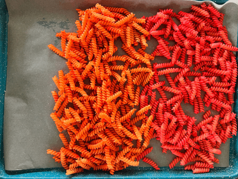 dyed pasta on tray