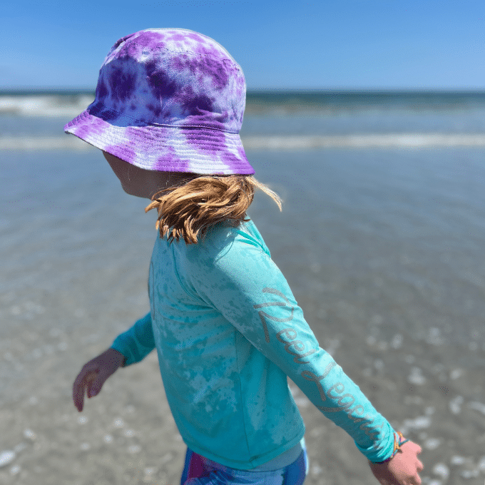 bucket hat at the beach