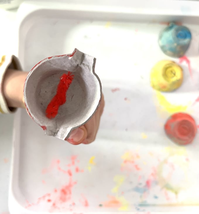 thread pipe cleaner through egg carton