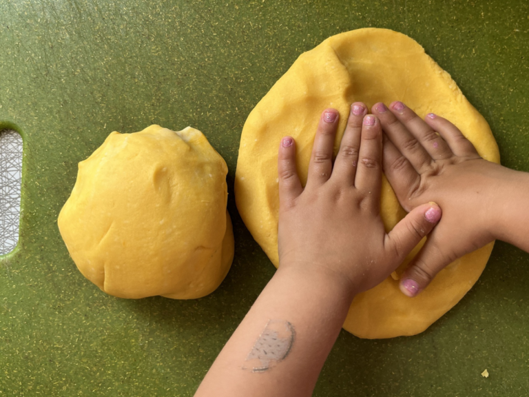 pressing out playdough