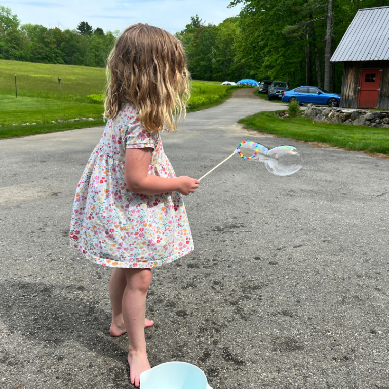 blowing bubbles outside