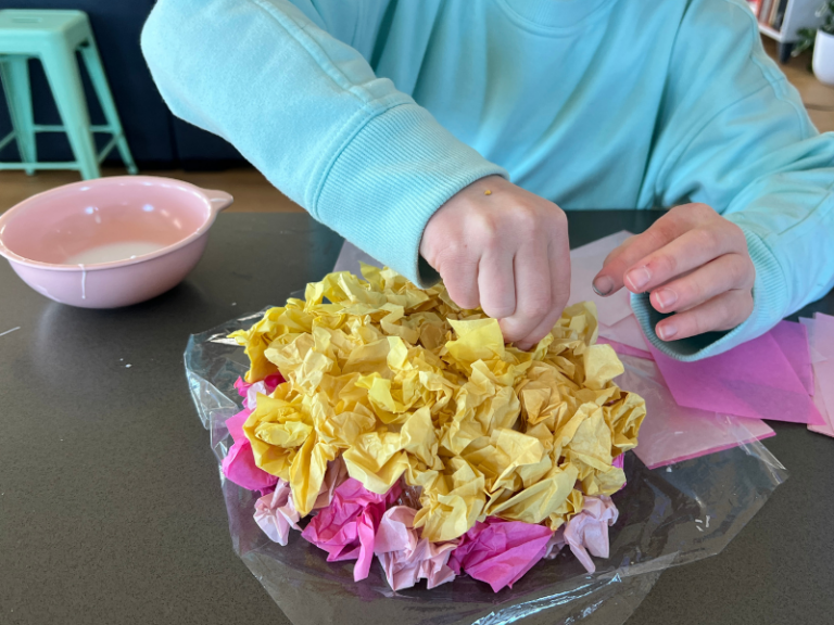 adding more tissue paper