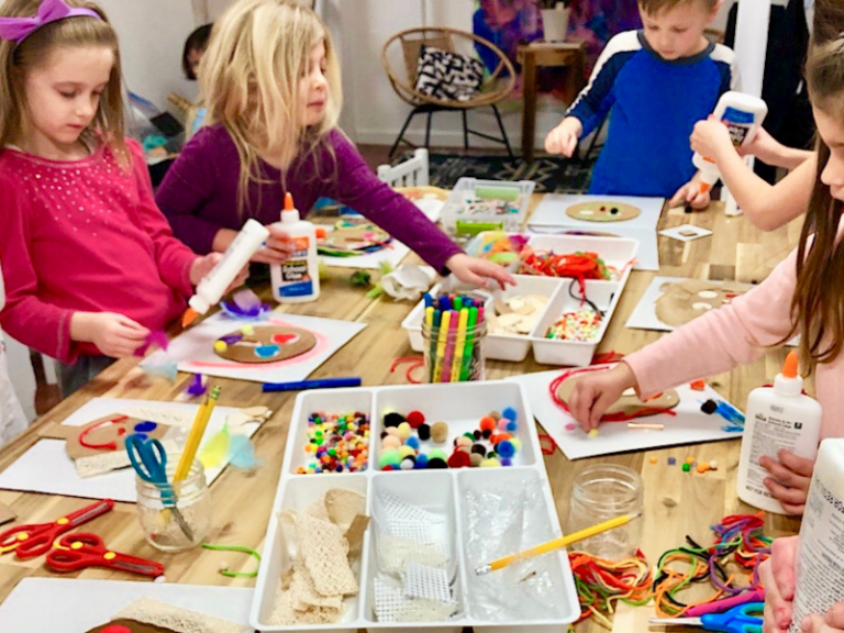 kids making mixed media collage portraits