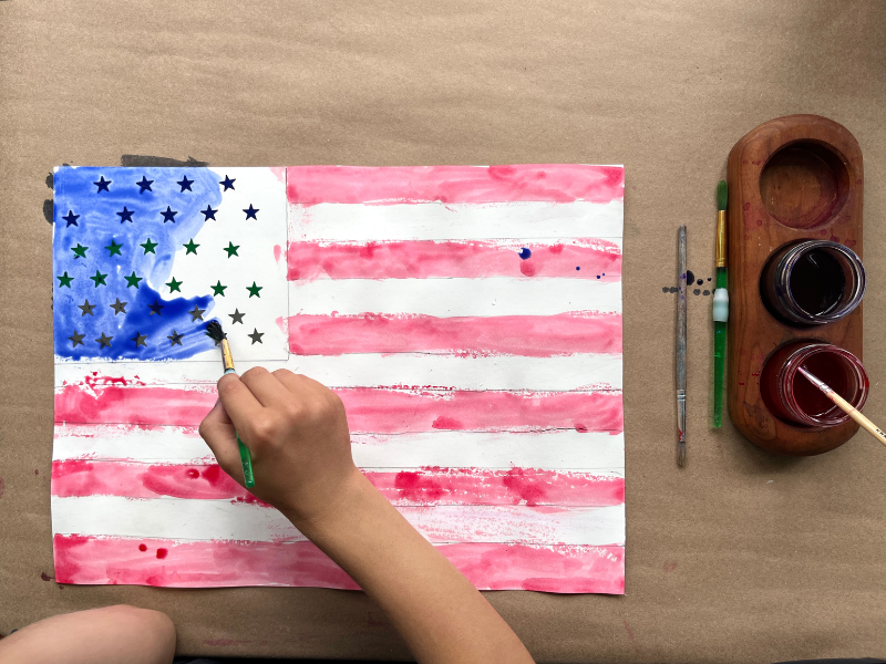 painting blue on flag