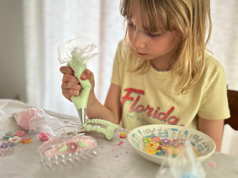 squeezing clay onto clip