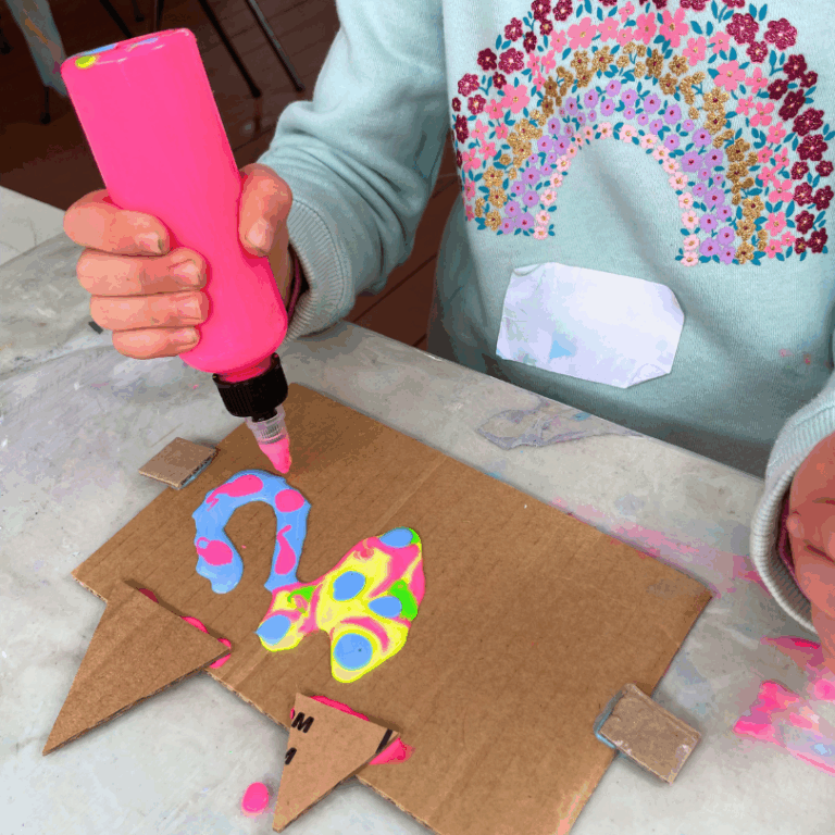 adding glue to cardboard